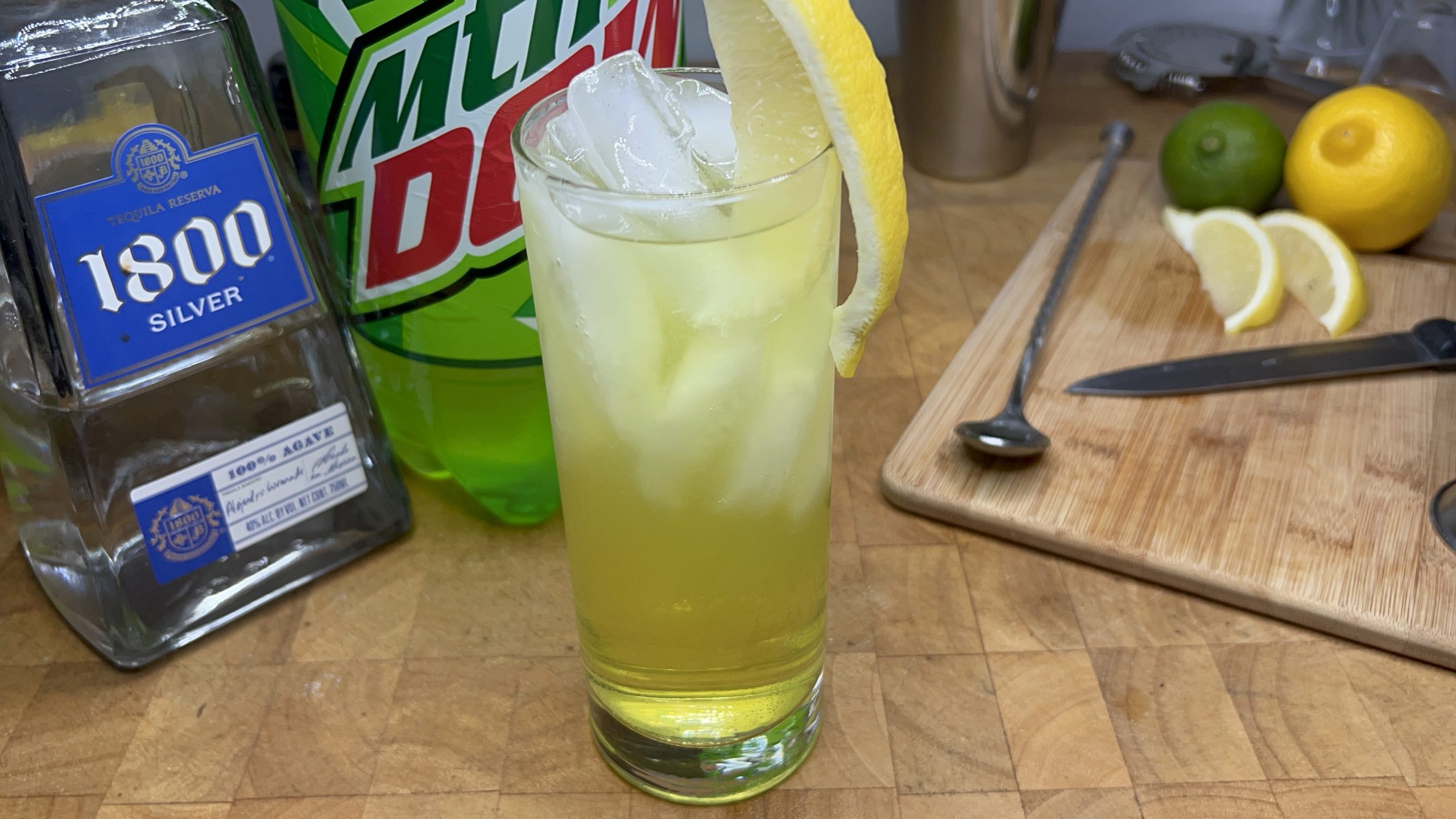 tequila and mountain dew in highball glass
