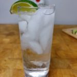 rum and soda with lime wedge
