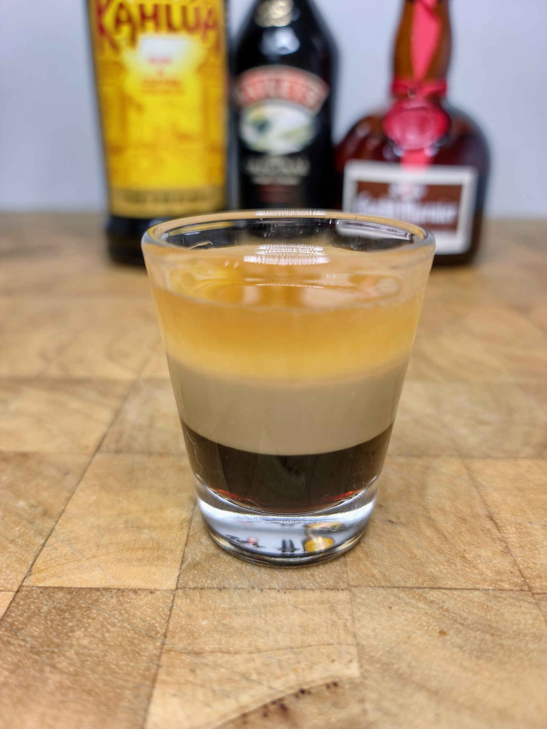b52 shot with bottles in background