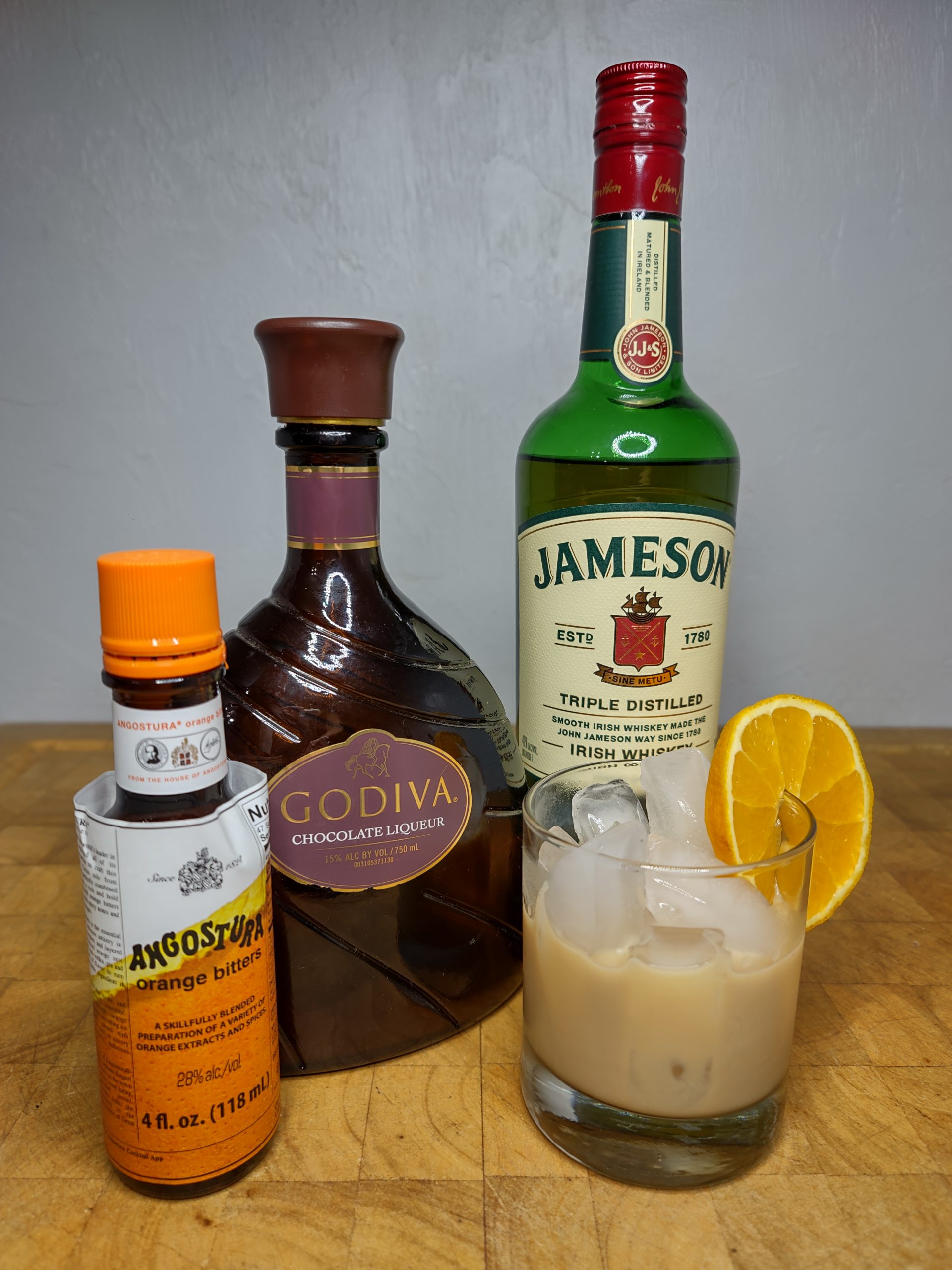 chocolate old fashioned with ingredients around it