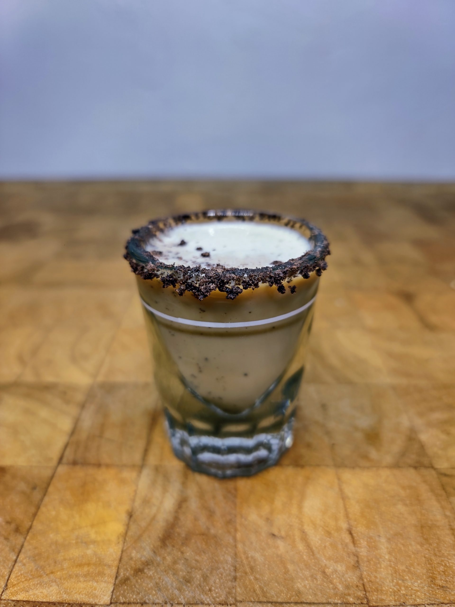 girl scout cookie shot on wooden table