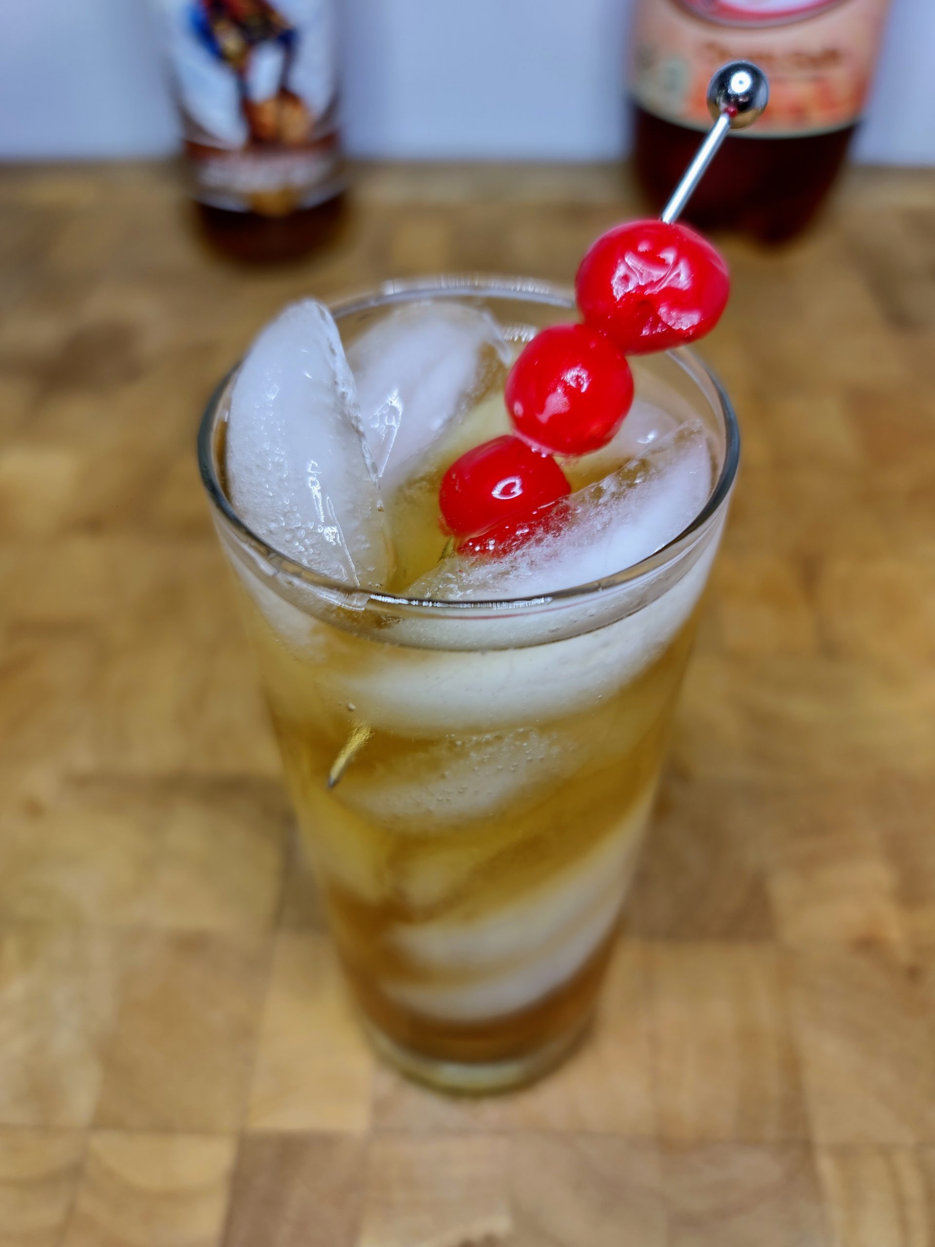 closeup of rum and cream soda in a glass