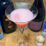 pornstar martini with shot glass of prosecco and all ingredients around the drink