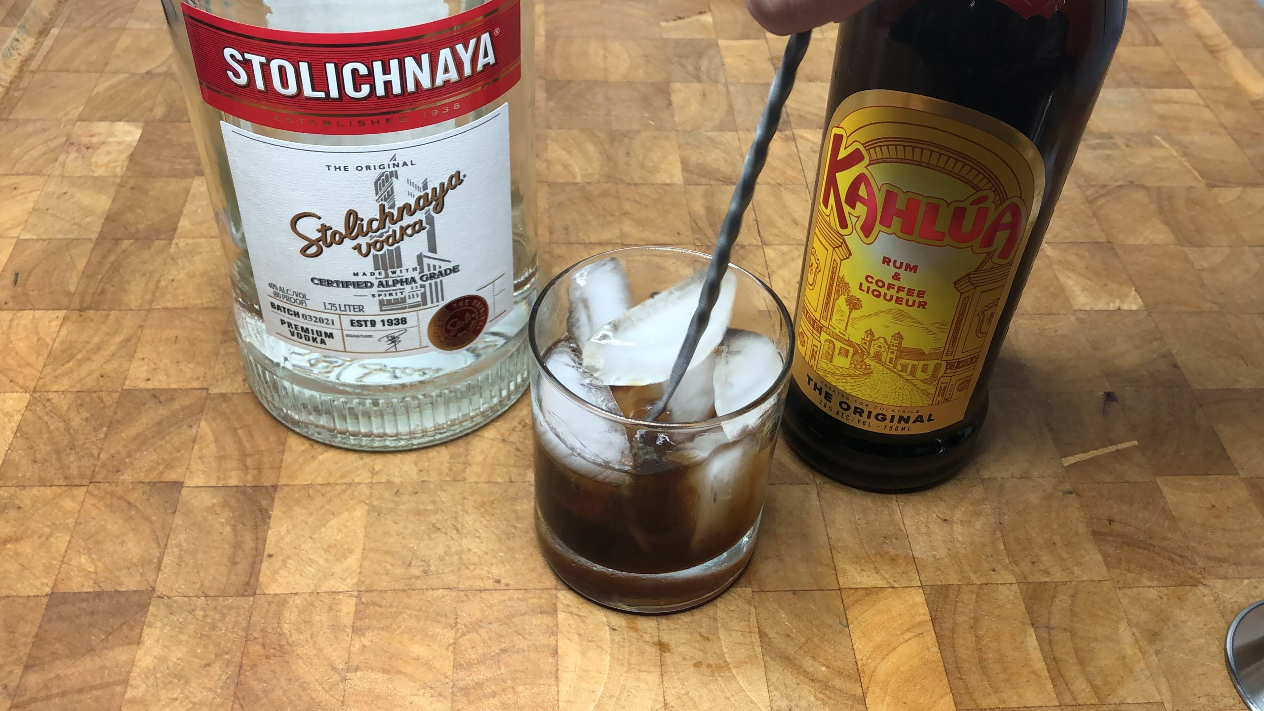 stirring black russian with a bar spoon