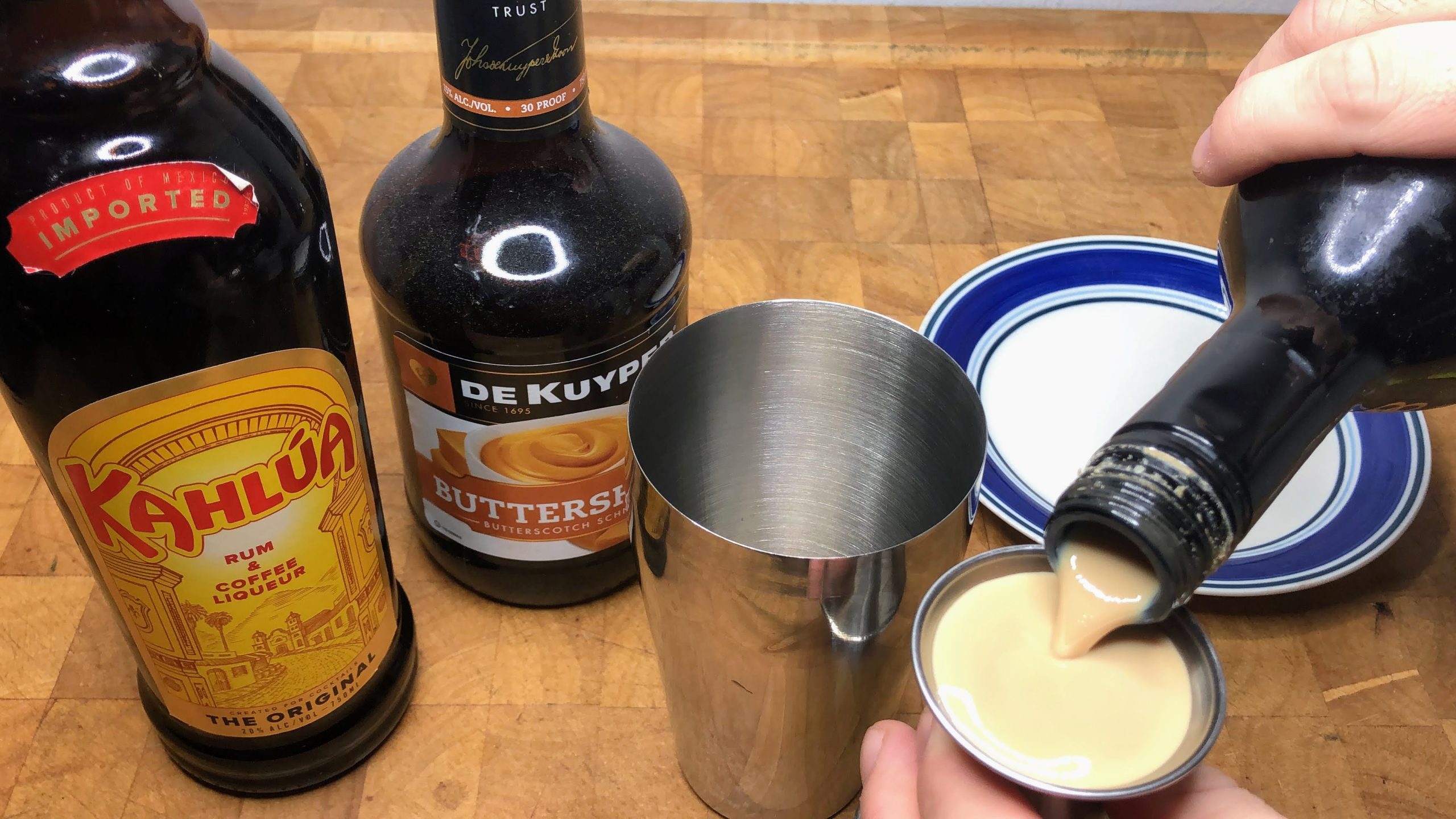 pouring irish cream in a jigger