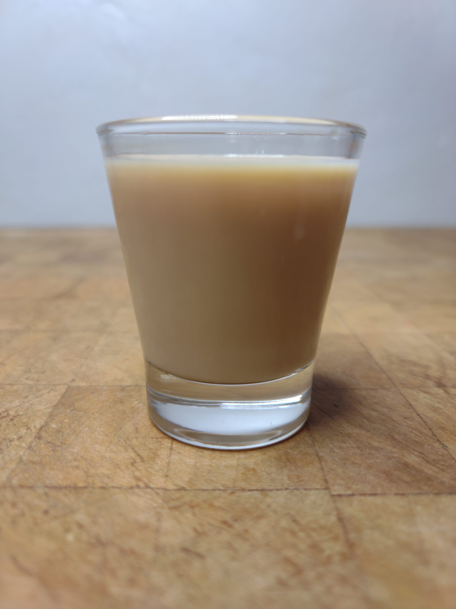 Oatmeal cookie shot on a wooden table.