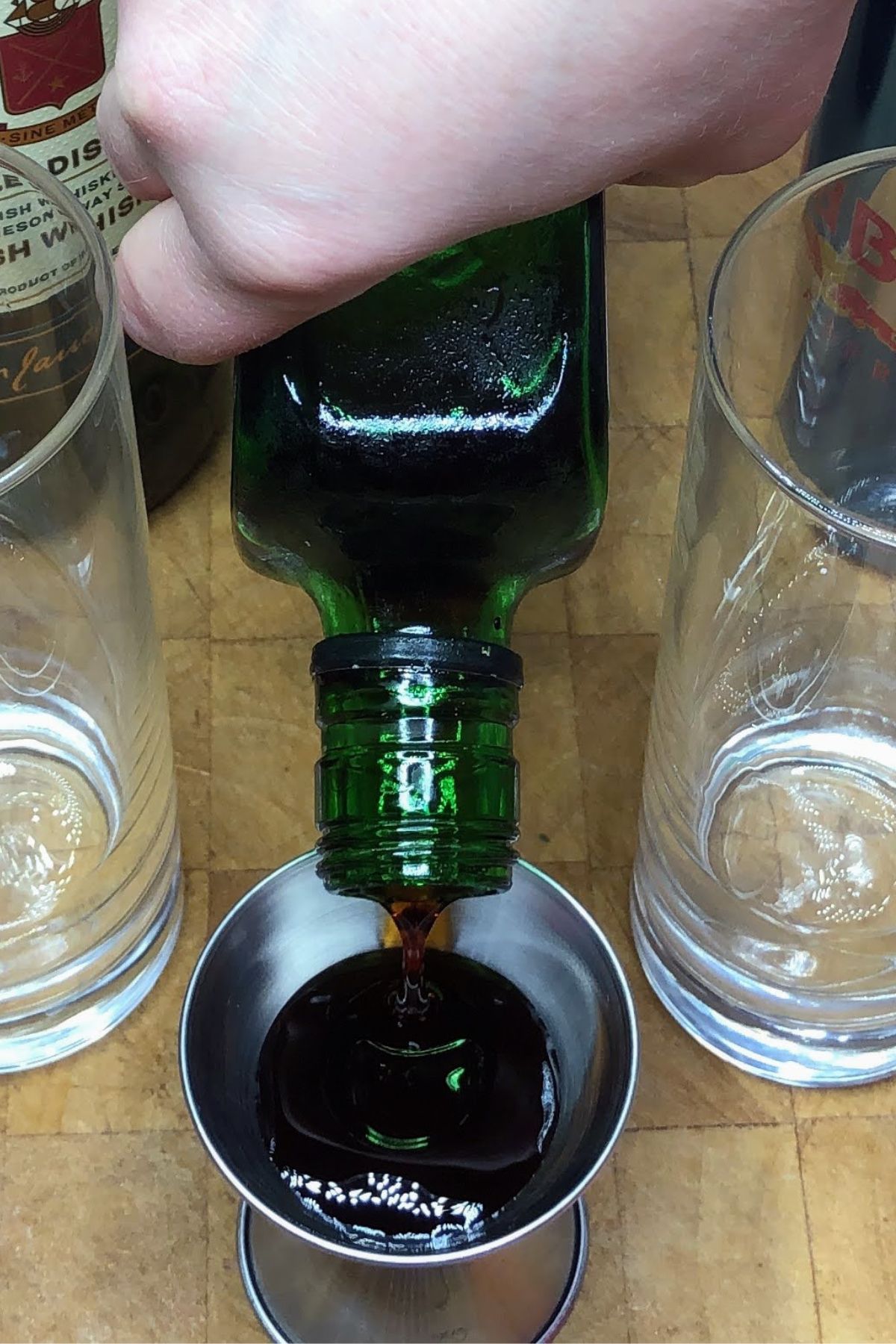 Measuring Jager with a jigger.