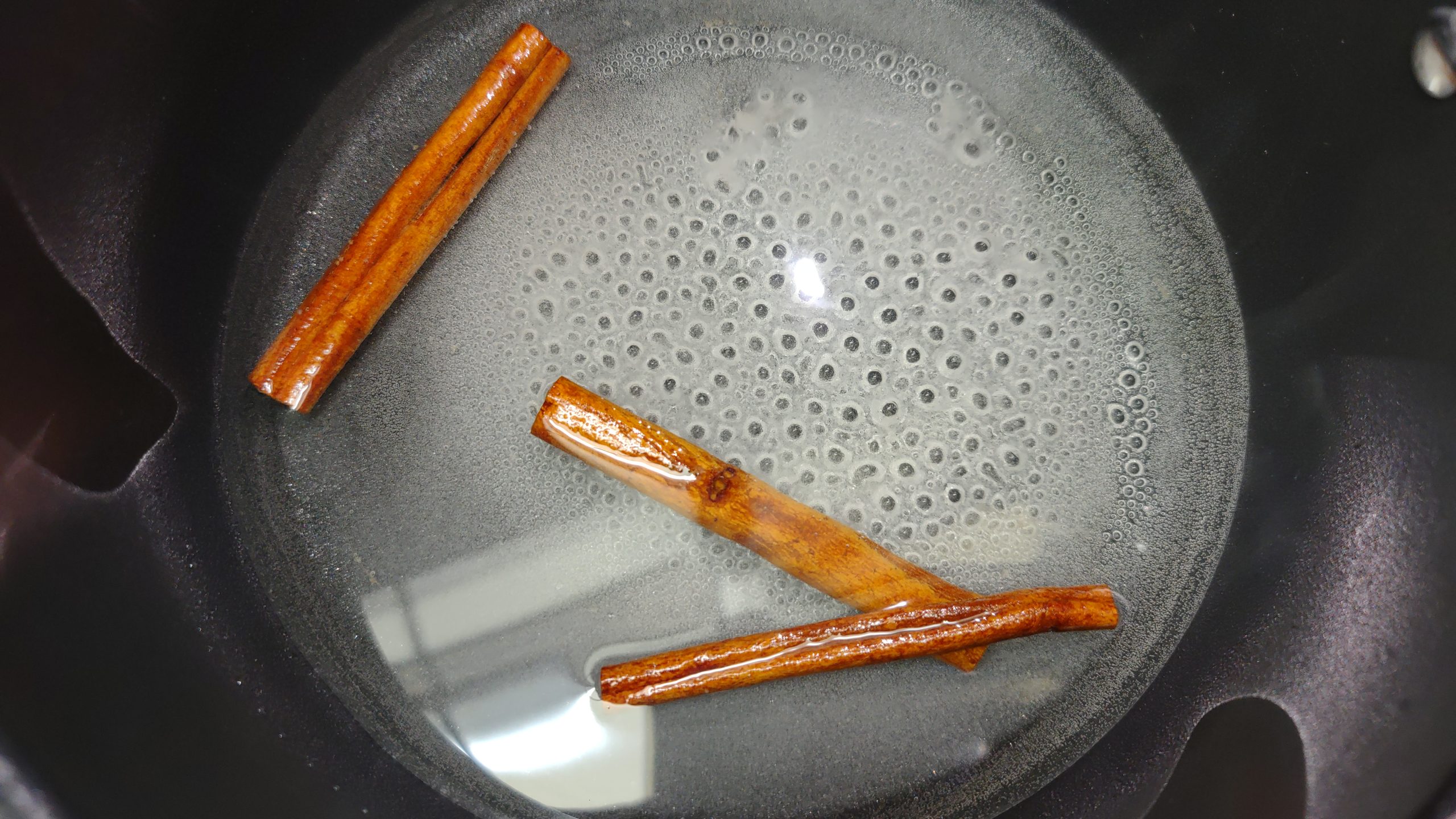 Simmering cinnamon simple syrup.