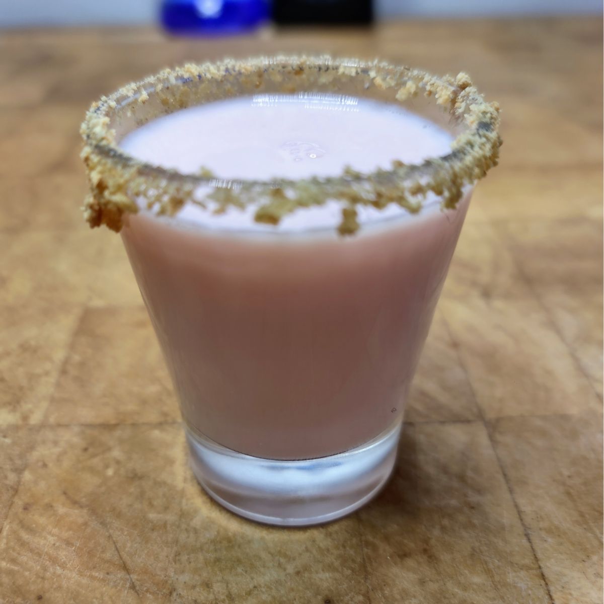 Strawberry shortcake shot on a wooden table.