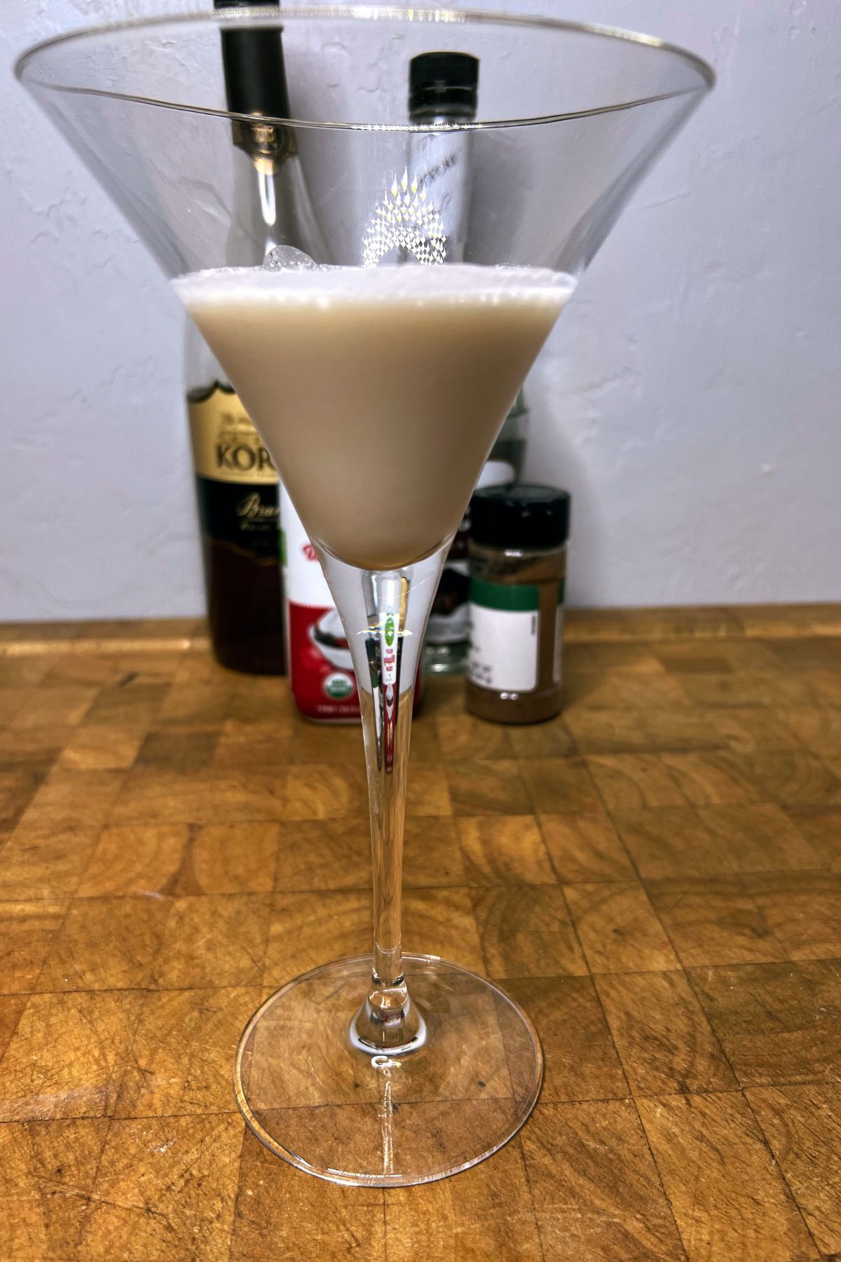 Brandy alexander drink on a wooden table.