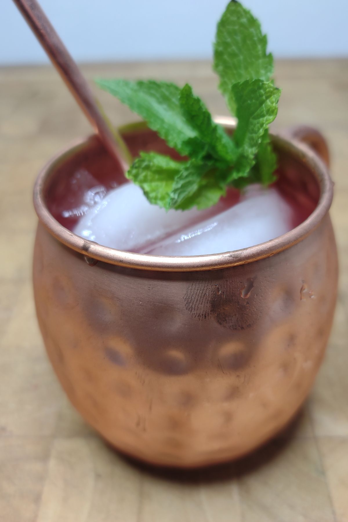Moscow mule on a wooden table.
